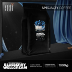 Blueberry Wellcream specialty coffee 1kg bag packaging displayed on dark set with curtain backdrop