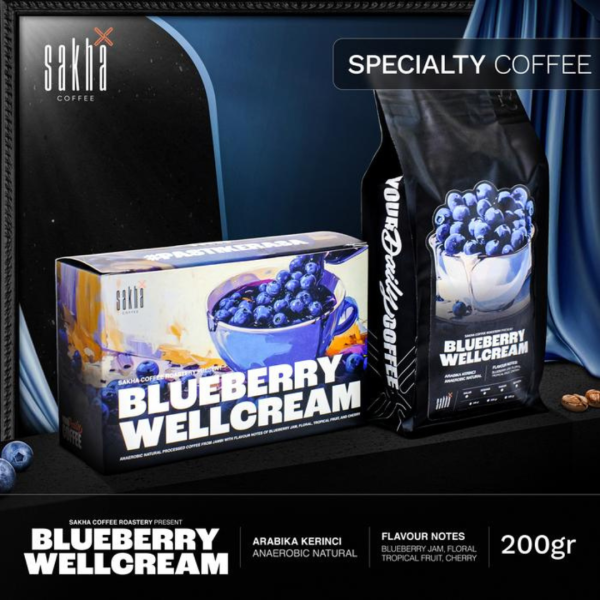 Blueberry Wellcream specialty coffee 200gr bag packaging displayed on dark set with curtain backdrop