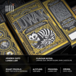 Wild Gayo Luwak coffee packaging with ornate black and gold design featuring civet illustration